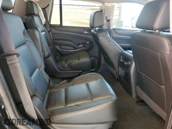 2019 Chevrolet Tahoe LT z VIN 1GNSKBKC9KR377051, wystawiony jako Copart lot #57666115 z przebiegiem 62 665 mil mil oraz Szkoda całkowita • Salvage title. Historia ofert i sprzedaży dostępna na DreamBid. Obrazek 11.