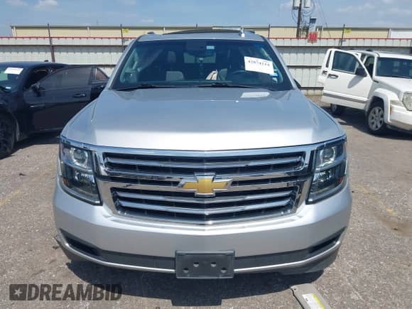 2018 Chevrolet Suburban LT z VIN 1GNSCHKC7JR317414, wystawiony jako IAAI lot #42874214 z przebiegiem 98 281 mil mil oraz . Historia ofert i sprzedaży dostępna na DreamBid. Obrazek 12.