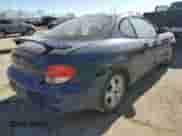 2001 Hyundai Tiburon с VIN KMHJG25F11U261457, выставлен на аукционе Copart как лот 43012635 с пробегом 165 625 миль миль и Списание • Salvage title. История ставок и продаж доступна на DreamBid. Изображение 3.