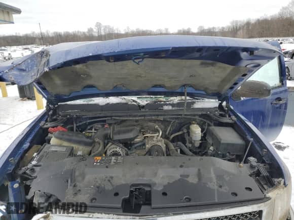 2013 Chevrolet Silverado 1500 Work Truck z VIN 1GCNKPEX5DZ268722, wystawiony jako Copart lot #87367074 z przebiegiem 64 669 mil mil oraz Szkoda całkowita • Salvage title. Historia ofert i sprzedaży dostępna na DreamBid. Obrazek 11.