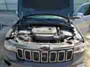 2018 Jeep Grand Cherokee Limited z VIN 1C4RJEBG5JC485571, wystawiony jako Copart lot #82130215 z przebiegiem 65 789 mil mil oraz Szkoda całkowita • Salvage title. Historia ofert i sprzedaży dostępna na DreamBid. Obrazek 17.