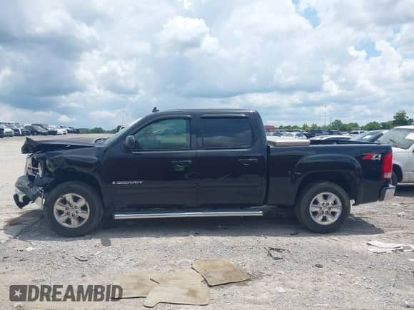 2009 GMC Sierra 1500 SLT with VIN 3GTEK33M49G202512, listed as a IAAI auction lot 42752111 with 166,671 mi miles and . Bid and sale history available at DreamBid. Image 14.