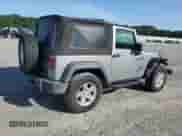 2016 Jeep Wrangler Willys Wheeler with VIN 1C4AJWAG4GL119680, listed as a Copart auction lot 65416205 with 96,057 mi miles and Salvage title. Bid and sale history available at DreamBid. Image 3.