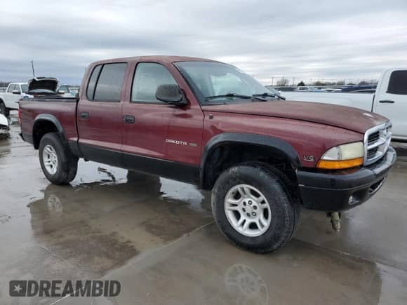 2002 Dodge Dakota SLT z VIN 1B7HG48N32S615218, wystawiony jako Copart lot #46933895 z przebiegiem Nie podano mil oraz Szkoda całkowita • Salvage title. Historia ofert i sprzedaży dostępna na DreamBid. Obrazek 4.