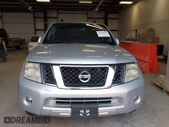 2011 Nissan Pathfinder LE z VIN 5N1AR1NB7BC605804, wystawiony jako IAAI lot #43544229 z przebiegiem 170 691 mil mil oraz . Historia ofert i sprzedaży dostępna na DreamBid. Obrazek 6.