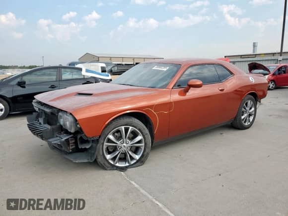 2020 Dodge Challenger SXT with VIN 2C3CDZGG5LH235183, listed as a Copart auction lot 80880285 with 77,904 mi miles and Salvage title. Bid and sale history available at DreamBid. Image 1.