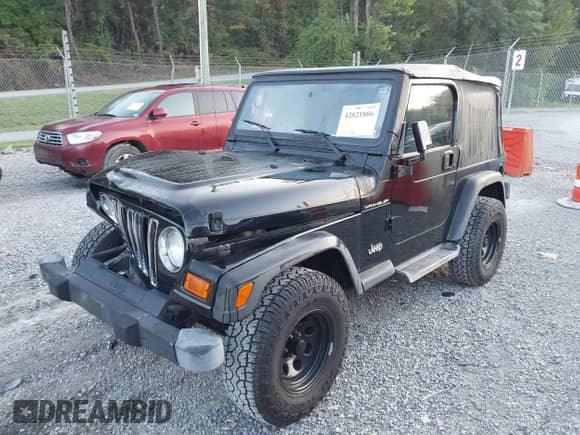 2001 Jeep Wrangler SE with VIN 1J4FA29P01P350847, listed as a IAAI auction lot 42821806 with 205,522 mi miles and . Bid and sale history available at DreamBid. Image 19.