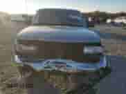 2000 Chevrolet Blazer LT with VIN 1GNCS13W9Y2145607, listed as a Copart auction lot 82137674 with 96,686 mi miles and Salvage title. Bid and sale history available at DreamBid. Image 5.