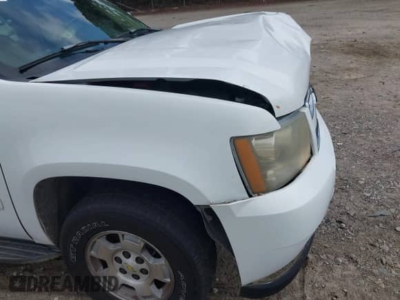 2007 Chevrolet Tahoe LS z VIN 1GNFC13017J290263, wystawiony jako IAAI lot #43319938 z przebiegiem 230 704 mil mil oraz . Historia ofert i sprzedaży dostępna na DreamBid. Obrazek 6.