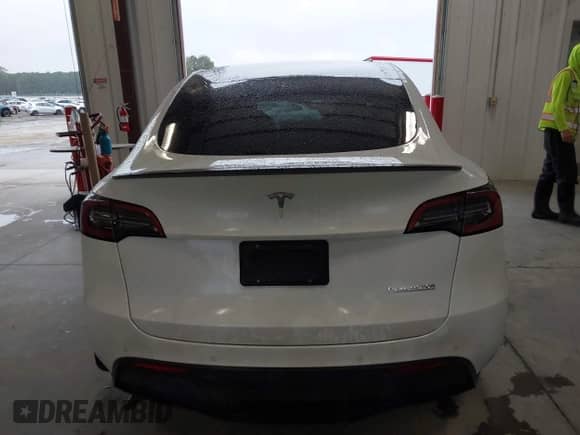 2021 Tesla Model Y Performance with VIN 5YJYGDEF7MF268781, listed as a IAAI auction lot 43312245 with 110,614 mi miles and . Bid and sale history available at DreamBid. Image 17.