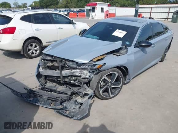 2021 Honda Accord Sport with VIN 1HGCV2F32MA016570, listed as a IAAI auction lot 43144113 with 57,712 mi miles and . Bid and sale history available at DreamBid. Image 2.