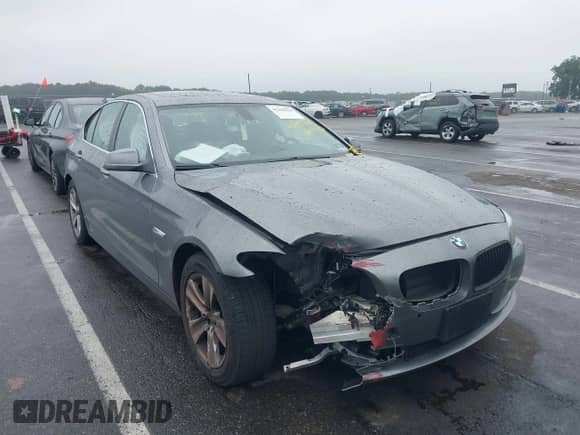 2012 BMW 5 Series 528i z VIN WBAXG5C52CDX06475, wystawiony jako IAAI lot #42440525 z przebiegiem 124 496 mil mil oraz . Historia ofert i sprzedaży dostępna na DreamBid. Obrazek 6.