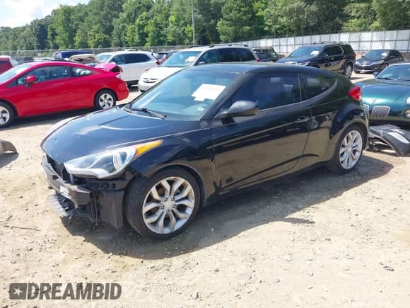 2012 Hyundai Veloster w/Black Int с VIN KMHTC6AD0CU056828, выставлен на аукционе IAAI как лот 42611623 с пробегом 136 242 миль миль и . История ставок и продаж доступна на DreamBid. Изображение 18.