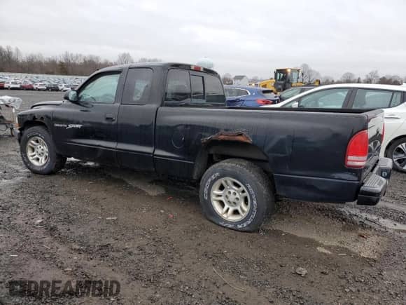 2001 Dodge Dakota Sport with VIN 1B7GL22N31S137577, listed as a Copart auction lot 50119405 with Not provided miles and Clean title. Bid and sale history available at DreamBid. Image 2.