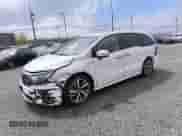2023 Honda Odyssey Touring z VIN 5FNRL6H81PB008129, wystawiony jako Copart lot #90663075 z przebiegiem 57 273 mil mil oraz Czysty tytuł • Clean title. Historia ofert i sprzedaży dostępna na DreamBid. Obrazek 1.