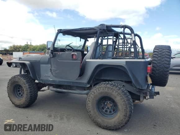 1990 Jeep Wrangler с VIN 2J4FY29T5LJ537896, выставлен на аукционе Copart как лот 57021295 с пробегом 143 753 миль миль и Чистый • Clean title. История ставок и продаж доступна на DreamBid. Изображение 2.