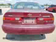 1997 Toyota Camry LE с VIN 4T1BF22K8VU033857, выставлен на аукционе Copart как лот 71679065 с пробегом 150 448 миль миль и Списание • Salvage title. История ставок и продаж доступна на DreamBid. Изображение 6.