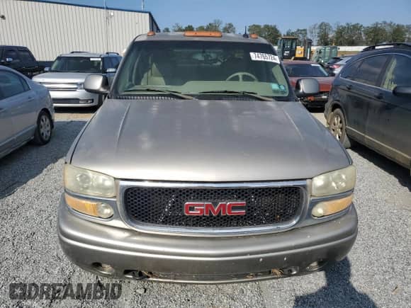 2002 GMC Sierra 1500 Denali z VIN 2GTFK69U421383350, wystawiony jako Copart lot #74765724 z przebiegiem Nie podano mil oraz Szkoda całkowita • Salvage title. Historia ofert i sprzedaży dostępna na DreamBid. Obrazek 5.
