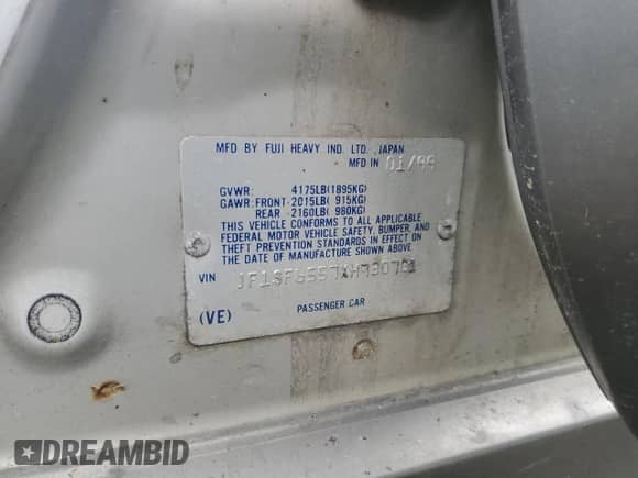 1999 Subaru Forester S with VIN JF1SF6557XH730701, listed as a Copart auction lot 65169235 with 142,246 mi miles and Salvage title. Bid and sale history available at DreamBid. Image 12.