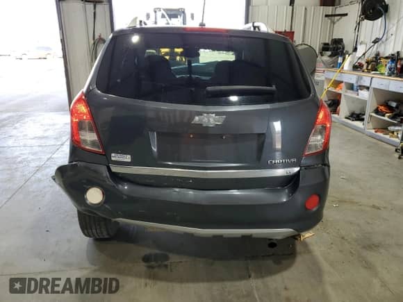 2013 Chevrolet Captiva Sport LT with VIN 3GNAL3EK0DS549162, listed as a Copart auction lot 62727224 with 104,717 mi miles and Salvage title. Bid and sale history available at DreamBid. Image 6.