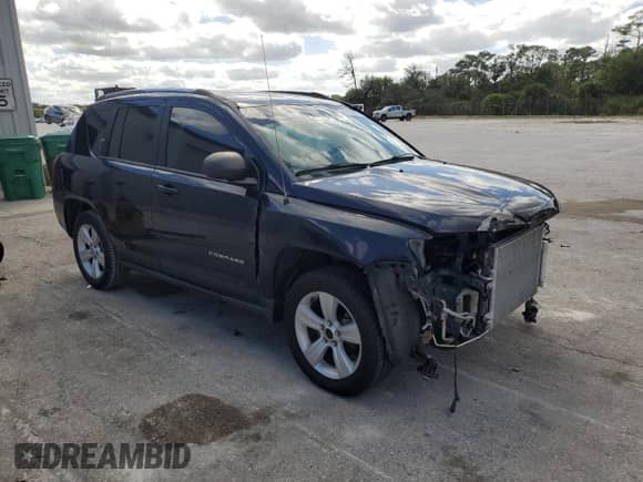 2014 Jeep Compass Sport z VIN 1C4NJCBB3ED679460, wystawiony jako Copart lot #87197415 z przebiegiem 117 309 mil mil oraz Szkoda całkowita • Salvage title. Historia ofert i sprzedaży dostępna na DreamBid. Obrazek 4.