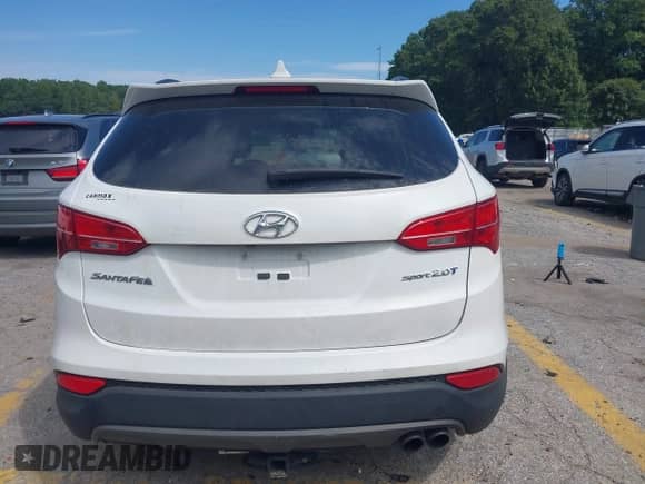 2014 Hyundai Santa Fe with VIN 5XYZU3LAXEG213640, listed as a IAAI auction lot 43119007 with 133,142 mi miles and . Bid and sale history available at DreamBid. Image 16.