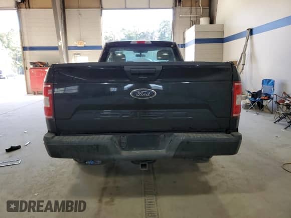 2020 Ford F-150 XL with VIN 1FTMF1CB9LKF19205, listed as a Copart auction lot 87380525 with 95,988 mi miles and Salvage title. Bid and sale history available at DreamBid. Image 6.