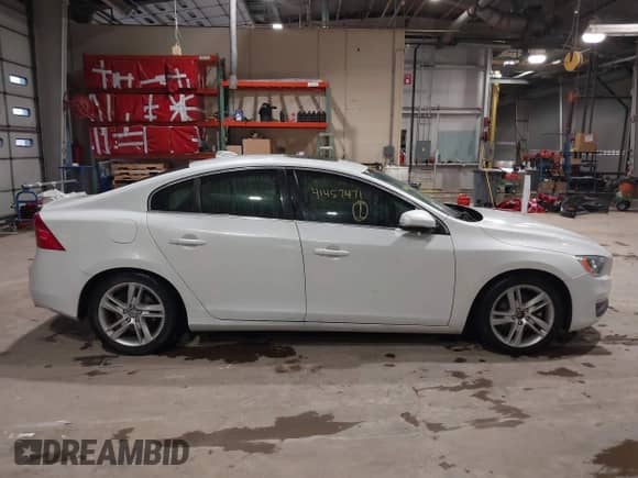 2015 Volvo S60 T5 Drive-E Premier with VIN YV126MFB4F1311693, listed as a IAAI auction lot 41457471 with 146,042 mi miles and . Bid and sale history available at DreamBid. Image 6.