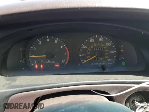 1995 Toyota Camry DX z VIN 4T1SK11E7SU494741, wystawiony jako Copart lot #59301035 z przebiegiem 180 794 mil mil oraz Szkoda całkowita • Salvage title. Historia ofert i sprzedaży dostępna na DreamBid. Obrazek 9.