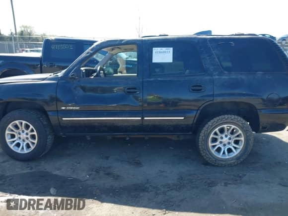 2000 Chevrolet Tahoe LT z VIN 1GNEK13TXYJ191872, wystawiony jako IAAI lot #41860033 z przebiegiem Nie podano mil oraz . Historia ofert i sprzedaży dostępna na DreamBid. Obrazek 14.