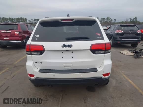 2018 Jeep Grand Cherokee Laredo E z VIN 1C4RJFAG2JC503130, wystawiony jako IAAI lot #41527333 z przebiegiem 95 669 mil mil oraz . Historia ofert i sprzedaży dostępna na DreamBid. Obrazek 16.