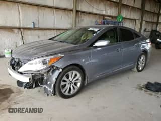 2014 Hyundai Azera с VIN KMHFG4JG8EA385801, выставлен на аукционе Copart как лот 63264715 с пробегом Не указан миль и Списание • Salvage title. История ставок и продаж доступна на DreamBid. Изображение 1.