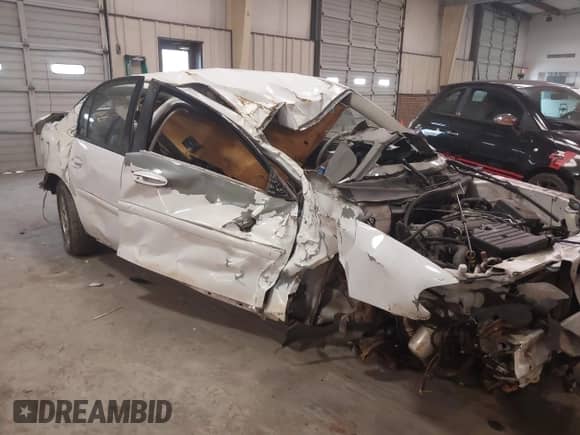 2004 Chevrolet Malibu Classic z VIN 1G1ND52F04M699548, wystawiony jako IAAI lot #41358609 z przebiegiem Nie podano mil oraz . Historia ofert i sprzedaży dostępna na DreamBid. Obrazek 6.