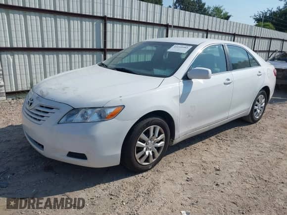 2009 Toyota Camry LE z VIN 4T1BE46K59U880088, wystawiony jako IAAI lot #43210981 z przebiegiem 63 904 mil mil oraz . Historia ofert i sprzedaży dostępna na DreamBid. Obrazek 17.