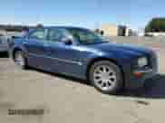 2005 Chrysler 300 C with VIN 2C3JA63H85H679092, listed as a Copart auction lot 70284705 with 191,335 mi miles and Salvage title. Bid and sale history available at DreamBid. Image 4.