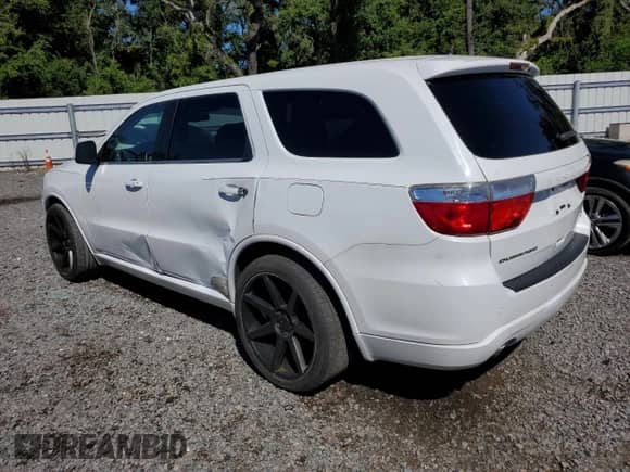 2013 Dodge Durango R/T с VIN 1C4SDHCT0DC678592, выставлен на аукционе Copart как лот 80804195 с пробегом 151 313 миль миль и Чистый • Clean title. История ставок и продаж доступна на DreamBid. Изображение 2.