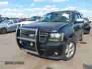 2007 Chevrolet Tahoe LT with VIN 1GNFC13J47R409143, listed as a IAAI auction lot 43302304 with 218,673 mi miles and . Bid and sale history available at DreamBid. Image 2.