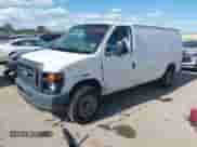 2013 Ford Econoline Cargo Commercial with VIN 1FTNE1EW1DDB34038, listed as a IAAI auction lot 42785150 with 306,839 mi miles and . Bid and sale history available at DreamBid. Image 2.