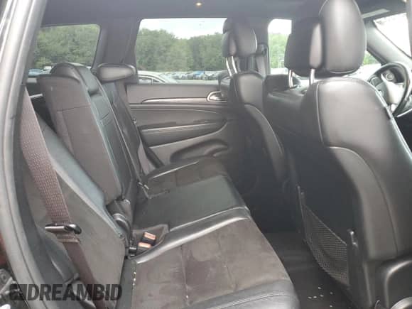 2020 Jeep Grand Cherokee Altitude with VIN 1C4RJFAG5LC159571, listed as a Copart auction lot 64872825 with 75,092 mi miles and Salvage title. Bid and sale history available at DreamBid. Image 11.