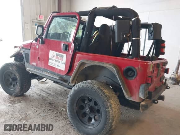 2005 Jeep Wrangler Rubicon with VIN 1J4FA69S05P351563, listed as a IAAI auction lot 42026418 with 211,034 mi miles and . Bid and sale history available at DreamBid. Image 3.