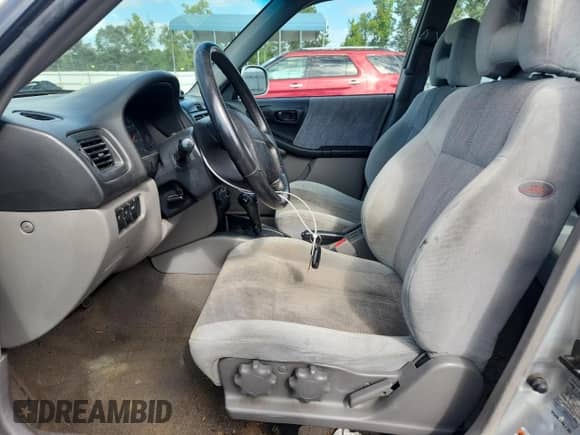 2002 Subaru Forester S with VIN JF1SF65692H723413, listed as a Copart auction lot 65161775 with 251,679 mi miles and Salvage title. Bid and sale history available at DreamBid. Image 7.