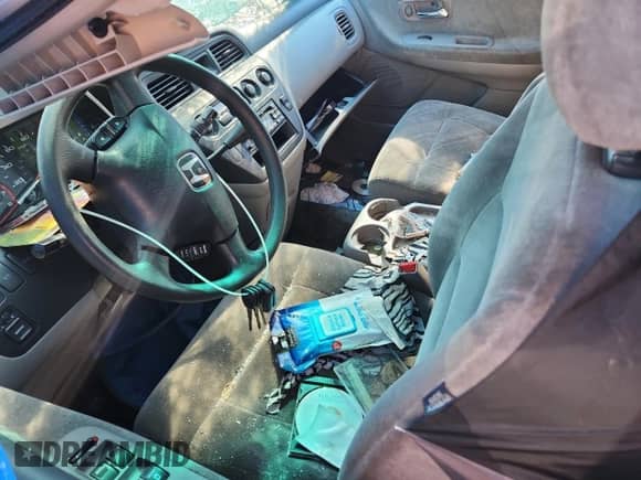 2002 Honda Odyssey EX z VIN 2HKRL18632H538291, wystawiony jako Copart lot #80021945 z przebiegiem Nie podano mil oraz Szkoda całkowita • Salvage title. Historia ofert i sprzedaży dostępna na DreamBid. Obrazek 7.