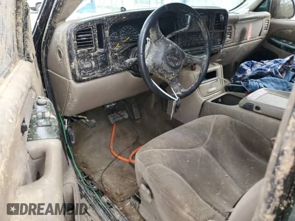 2001 GMC Sierra 1500 SLE z VIN 2GTEC19V411310370, wystawiony jako Copart lot #52950885 z przebiegiem 240 629 mil mil oraz Szkoda całkowita • Salvage title. Historia ofert i sprzedaży dostępna na DreamBid. Obrazek 8.