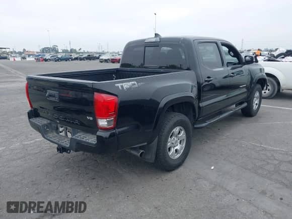 2017 Toyota Tacoma SR5 with VIN 3TMAZ5CN4HM047698, listed as a IAAI auction lot 42465382 with 132,297 mi miles and . Bid and sale history available at DreamBid. Image 4.