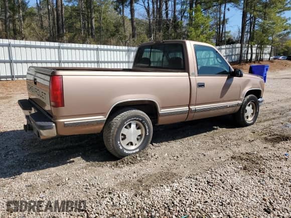 1997 Chevrolet Silverado 1500 with VIN 1GCEC14R4VZ211975, listed as a Copart auction lot 50190115 with 132,978 mi miles and Salvage title. Bid and sale history available at DreamBid. Image 3.