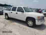 2006 GMC Sierra 1500 SLT with VIN 2GTEK13T261245231, listed as a Copart auction lot 59217485 with 152,098 mi miles and Salvage title. Bid and sale history available at DreamBid. Image 4.