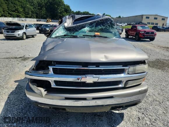 2002 Chevrolet Tahoe LT z VIN 1GNEC13Z02R203957, wystawiony jako Copart lot #62884295 z przebiegiem 235 209 mil mil oraz Szkoda całkowita • Salvage title. Historia ofert i sprzedaży dostępna na DreamBid. Obrazek 5.