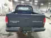2004 Dodge Dakota Sport z VIN 1D7HL38NX4S579042, wystawiony jako Copart lot #85283564 z przebiegiem 327 981 mil mil oraz Szkoda całkowita • Salvage title. Historia ofert i sprzedaży dostępna na DreamBid. Obrazek 6.