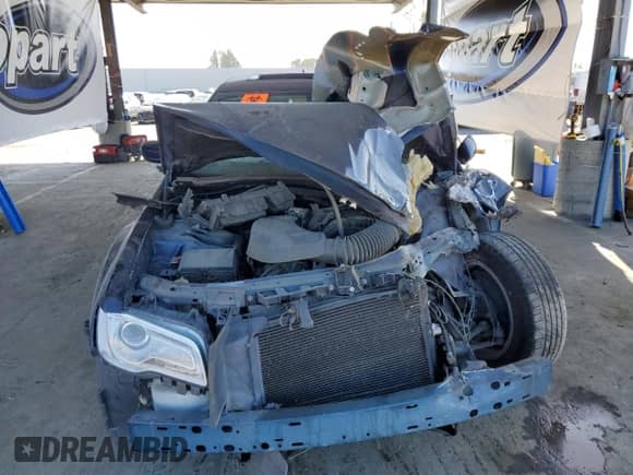 2015 Chrysler 300 Limited with VIN 2C3CCAAG1FH864215, listed as a Copart auction lot 56018625 with 131,861 mi miles and Salvage title. Bid and sale history available at DreamBid. Image 5.