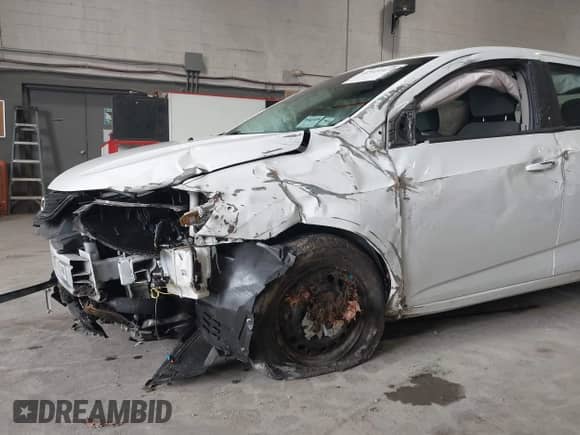 2020 Chevrolet Sonic LT with VIN 1G1JG6SB9L4110004, listed as a IAAI auction lot 41921452 with 106,676 mi miles and . Bid and sale history available at DreamBid. Image 6.